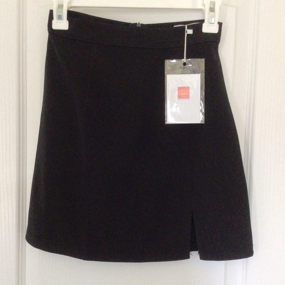 Womens XS black skirt with built in shorts.